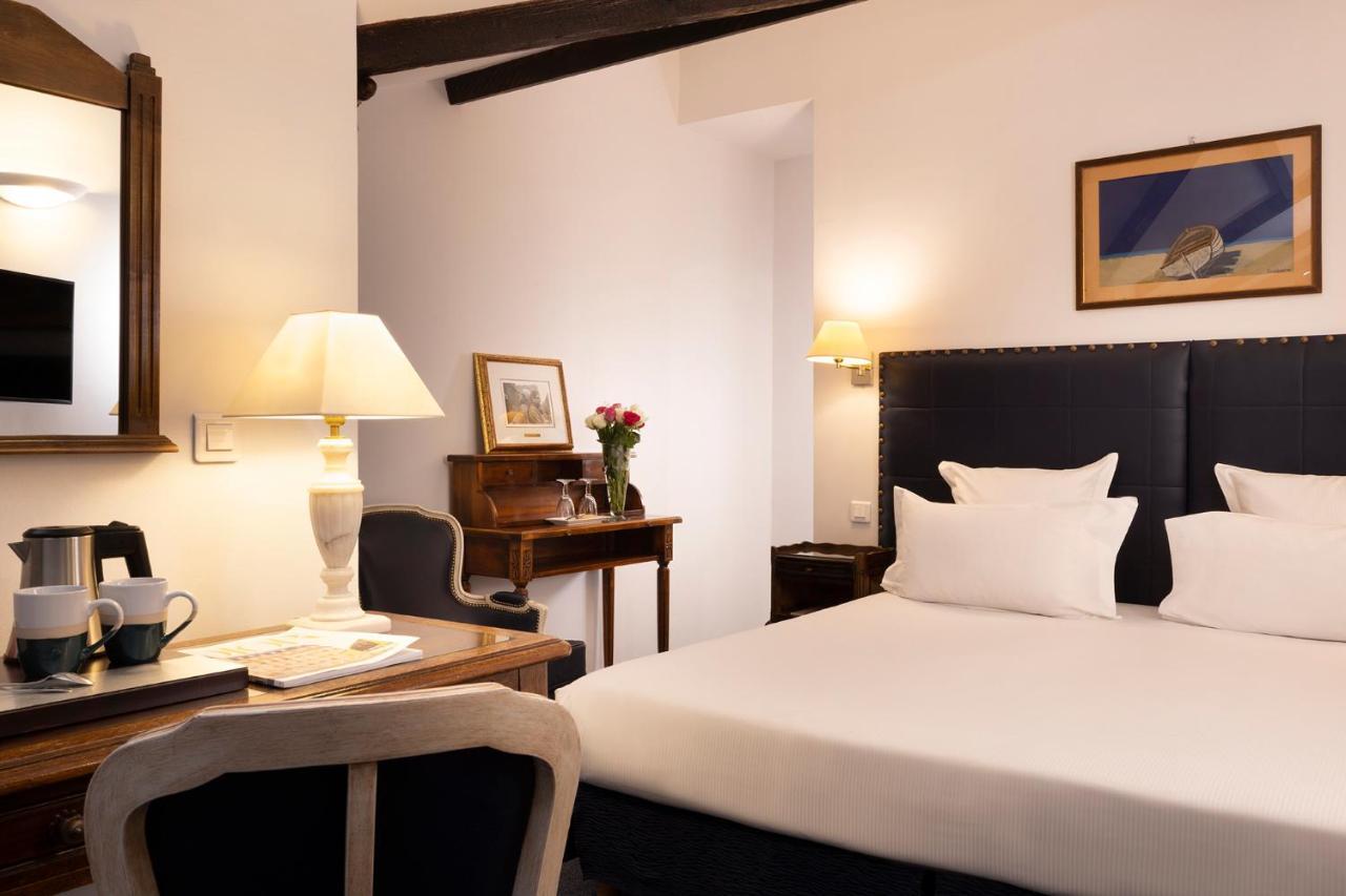 Relais Hotel Du Vieux Париж Екстериор снимка